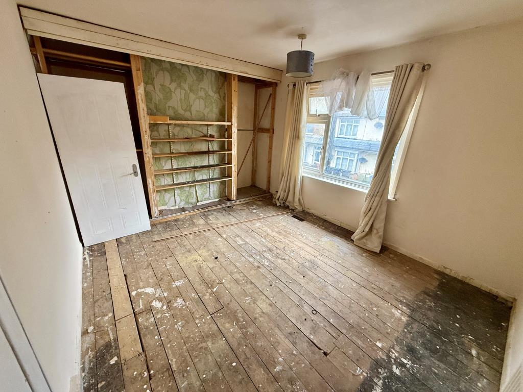 Lot: 112 - MID-TERRACED HOUSE FOR REFURBISHMENT - Bedroom one